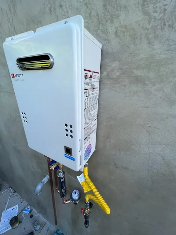 Tankless water heater installation for Vista Ridge Village homes